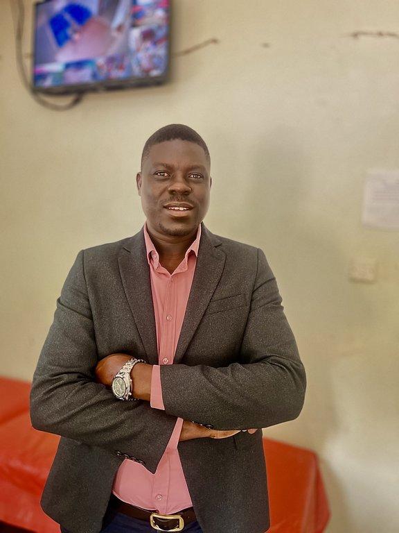 Dr. Michael Emusugut